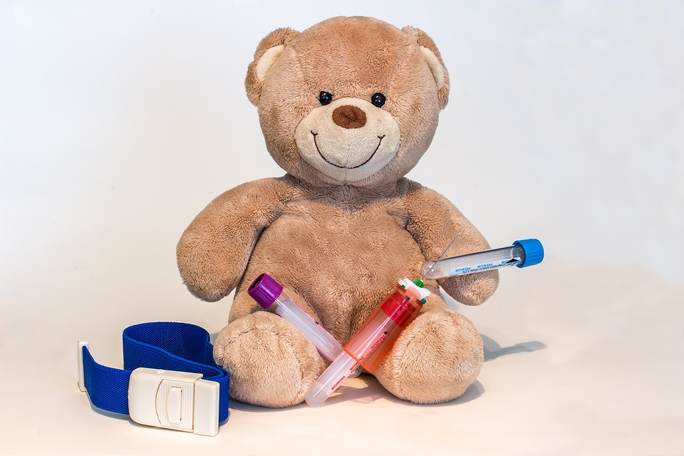 teddy bear and medical supplies